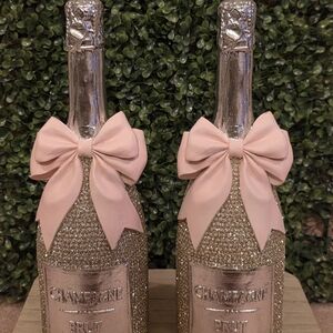 Gold Champagne Bottles with Pink Bows